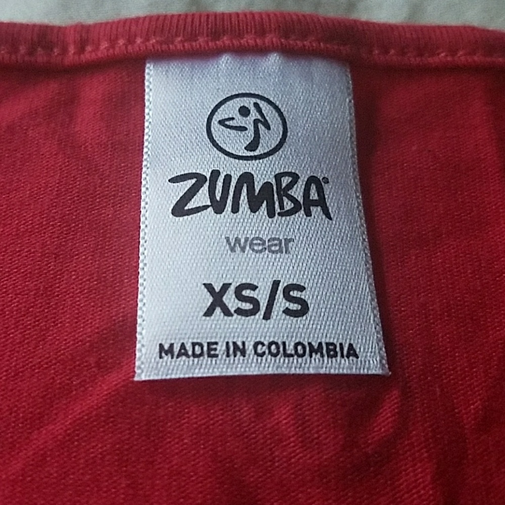 FLASH SALE!! Gently Used Zumba Fitness Loose Top Size XS/S - Picture 2 of 3